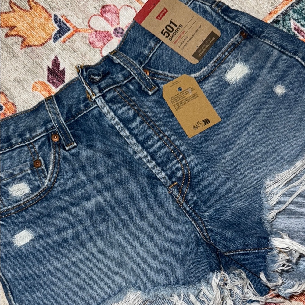 501 Levi's Blue Distressed Denim Shorts